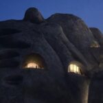 Mountain Cave Suites illuminated in the mountains