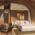 Mountain Cave Suite bedroom at Desert Rock Resort