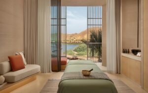 Spa treatment room with lagoon view at Six Senses AMAALA